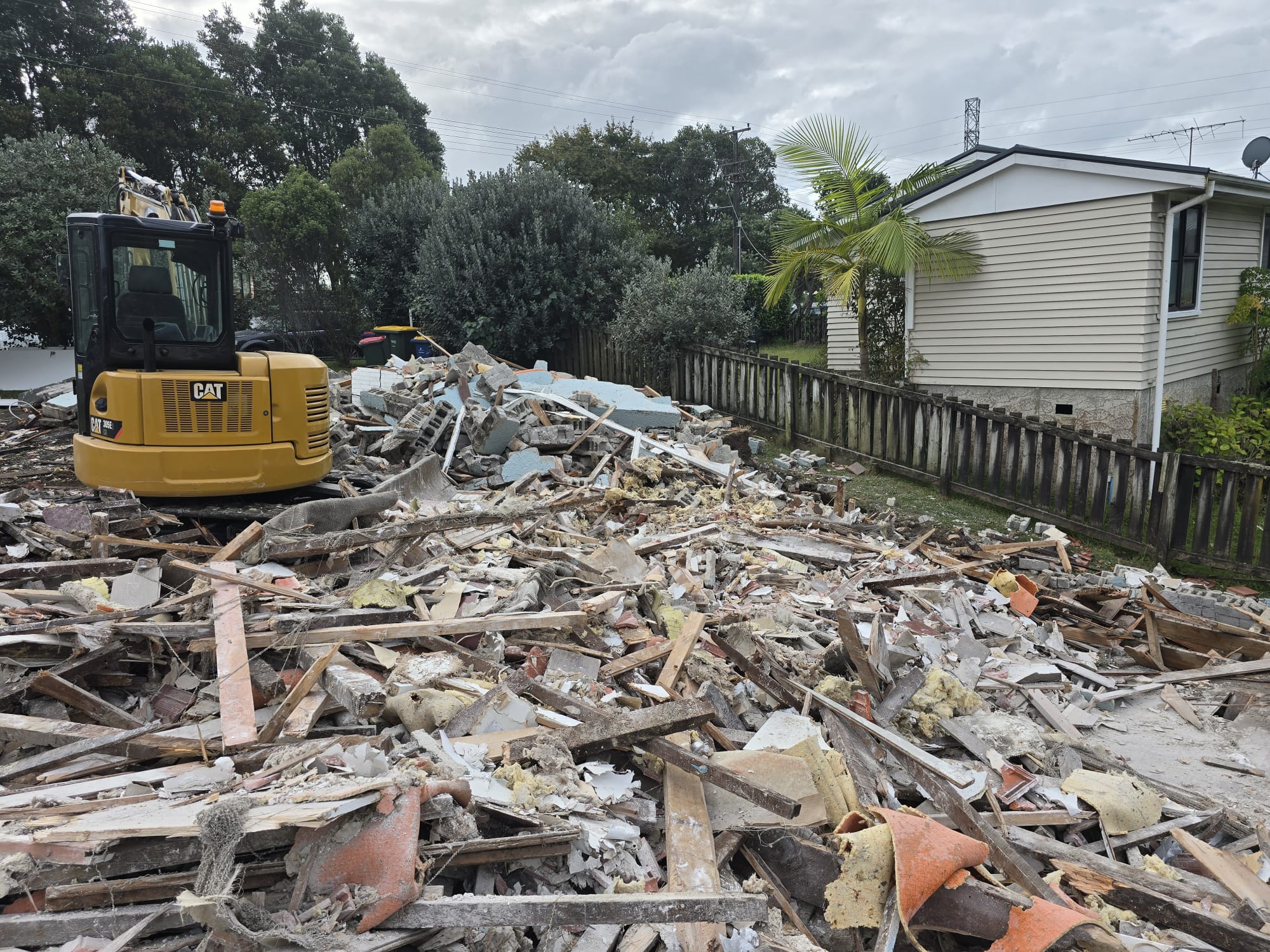 Clearing the site — Material sorted and hauled away for recycling